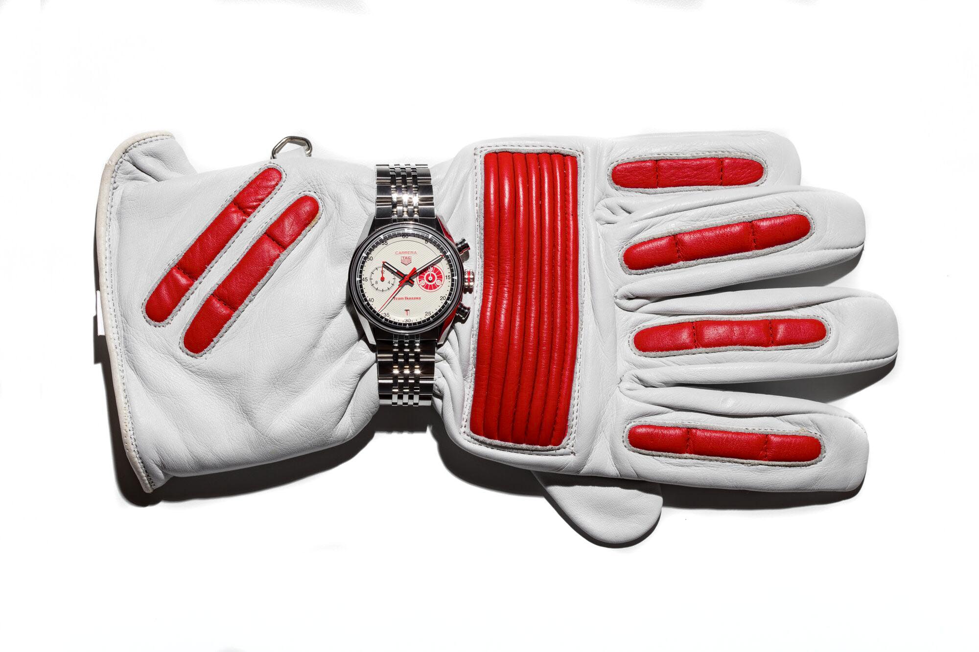 TAG Heuer Carrera Chronograph x Team Ikuzawa limited edition 39mm watch on red racing glove