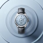 Reloj Longines Conquest Heritage Central Power Reserve con esfera azul claro opalino y correa de cuero gris