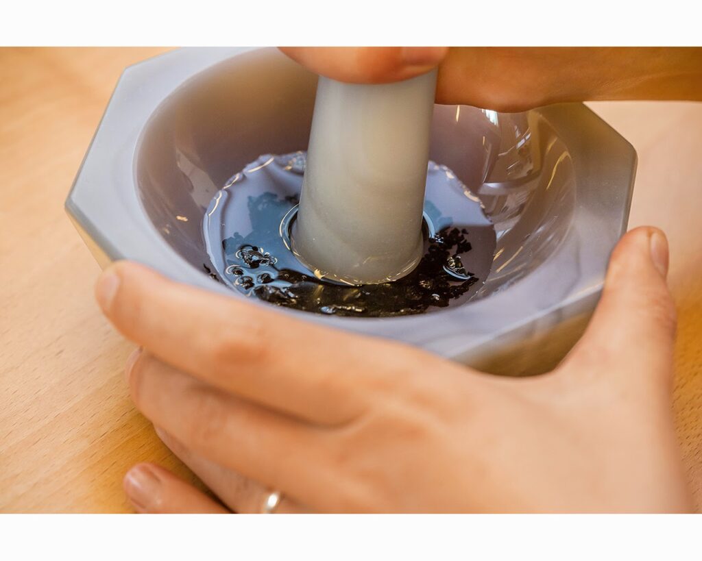 Purifying enamel powder with distilled water