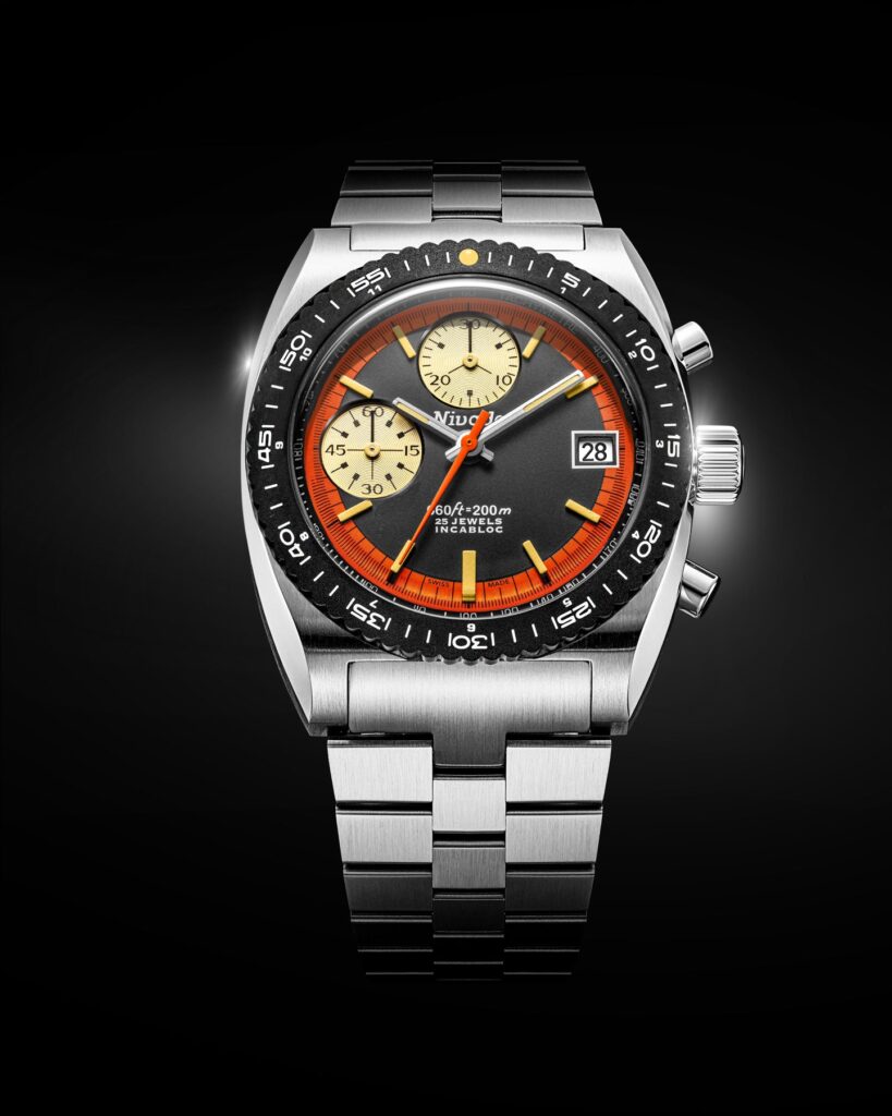 Vista frontal de la esfera del cronógrafo Nivada Grenchen Autochron Orange Automatic