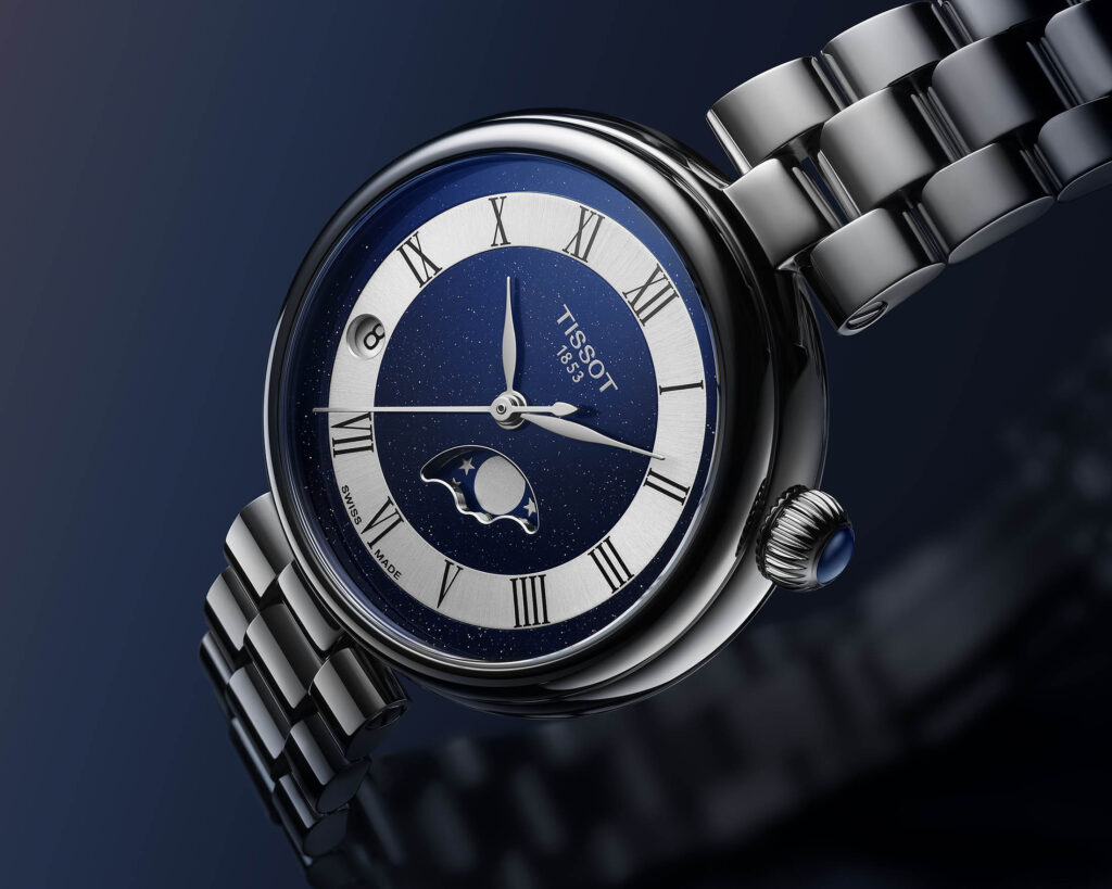 Detalle de la esfera azul con inclusiones minerales y fase lunar del Tissot Désir Moonphase