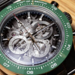 Close-up detail of the openworked smoked sapphire dial and green ceramic bezel on the Zenith Chronomaster Sport Skeleton chronograph