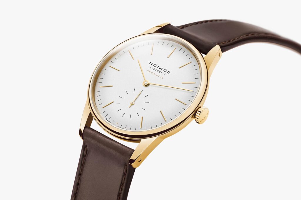 NOMOS Orion Gold Neomatik ESFERA INDICES Y AGUJAS DORADAS