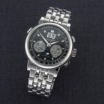 A. Lange & Söhne Datograph Perpetuo en platino 950 con esfera negra e índices de diamante baguette para la portada de Debajo del Reloj.