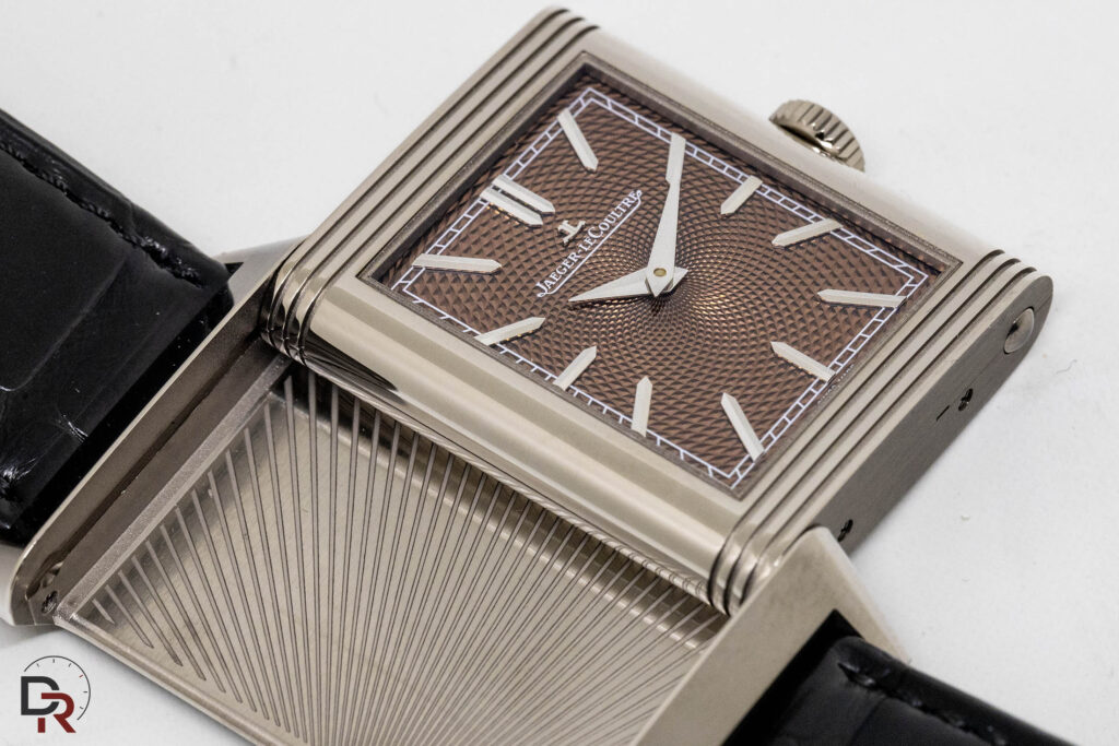 Pivoting cradle mechanism of the Jaeger-LeCoultre Reverso featuring sunburst guilloché engraving